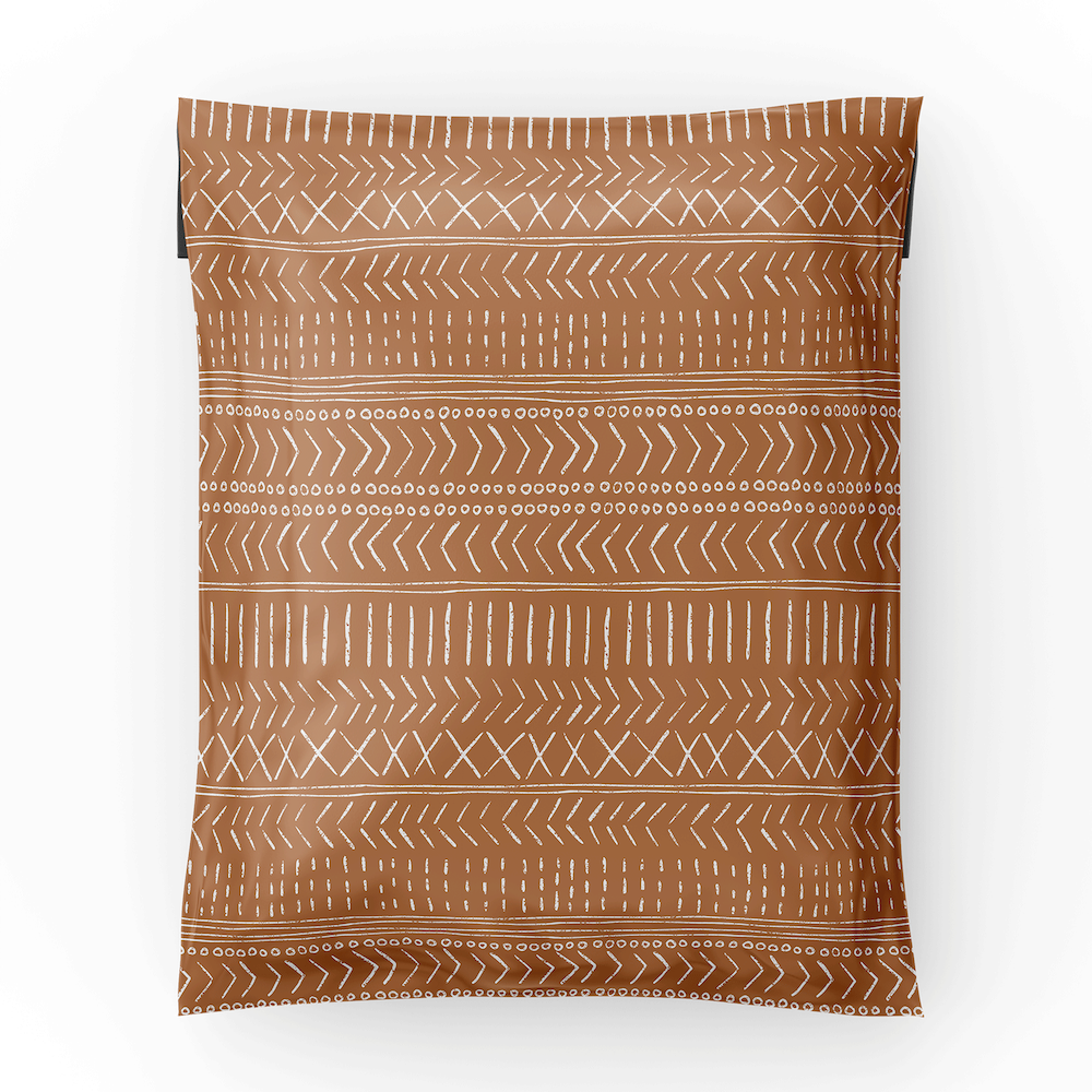 12x15.5 brown polymailer shipping bag laid flat showing the geometric lines over the brown background