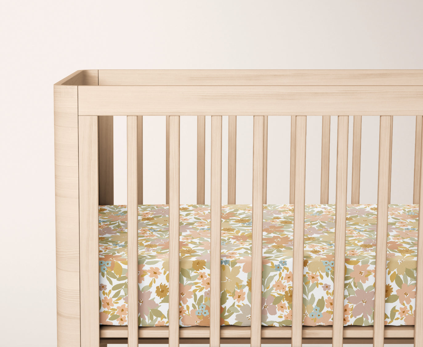 floral crib sheet with a lot of colorful flowers