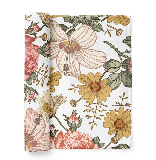This is a best-selling mini wander swaddle for babies with garden floral designs of Hibiscus flower, sunflower, and rose. This is made from muslin cotton that is light and breathable.