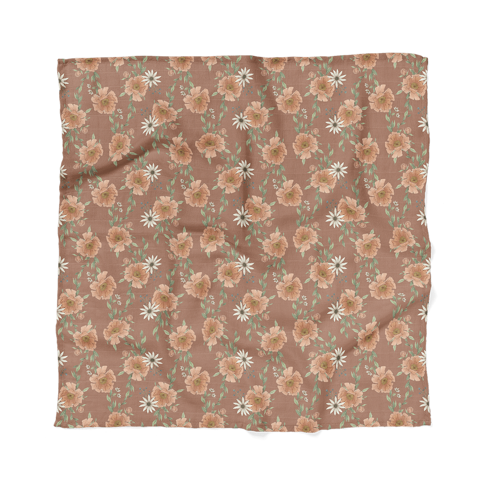 peony blooms clay brown muslin swaddle blanket laid flat