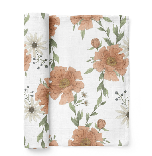The Mini Wander peony swaddle folded showing the beautiful peony flowers and buds