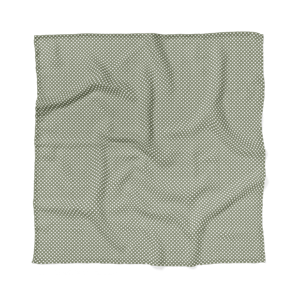 polka dot sage green swaddle blanket laid flat