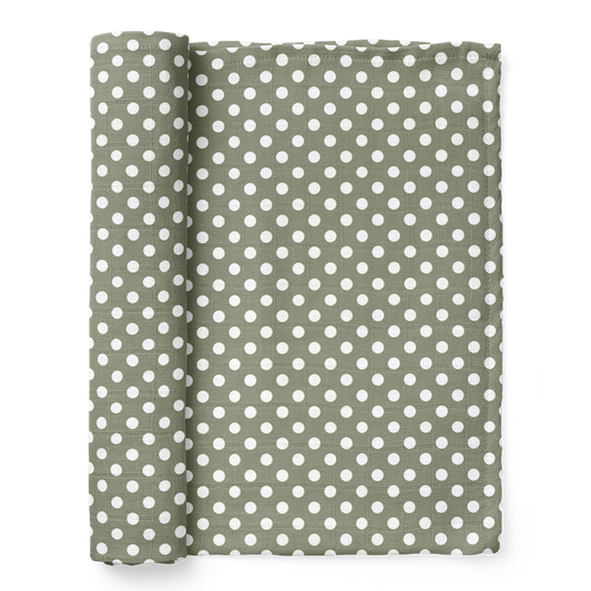 polka dot sage green swaddle blanket half rolled