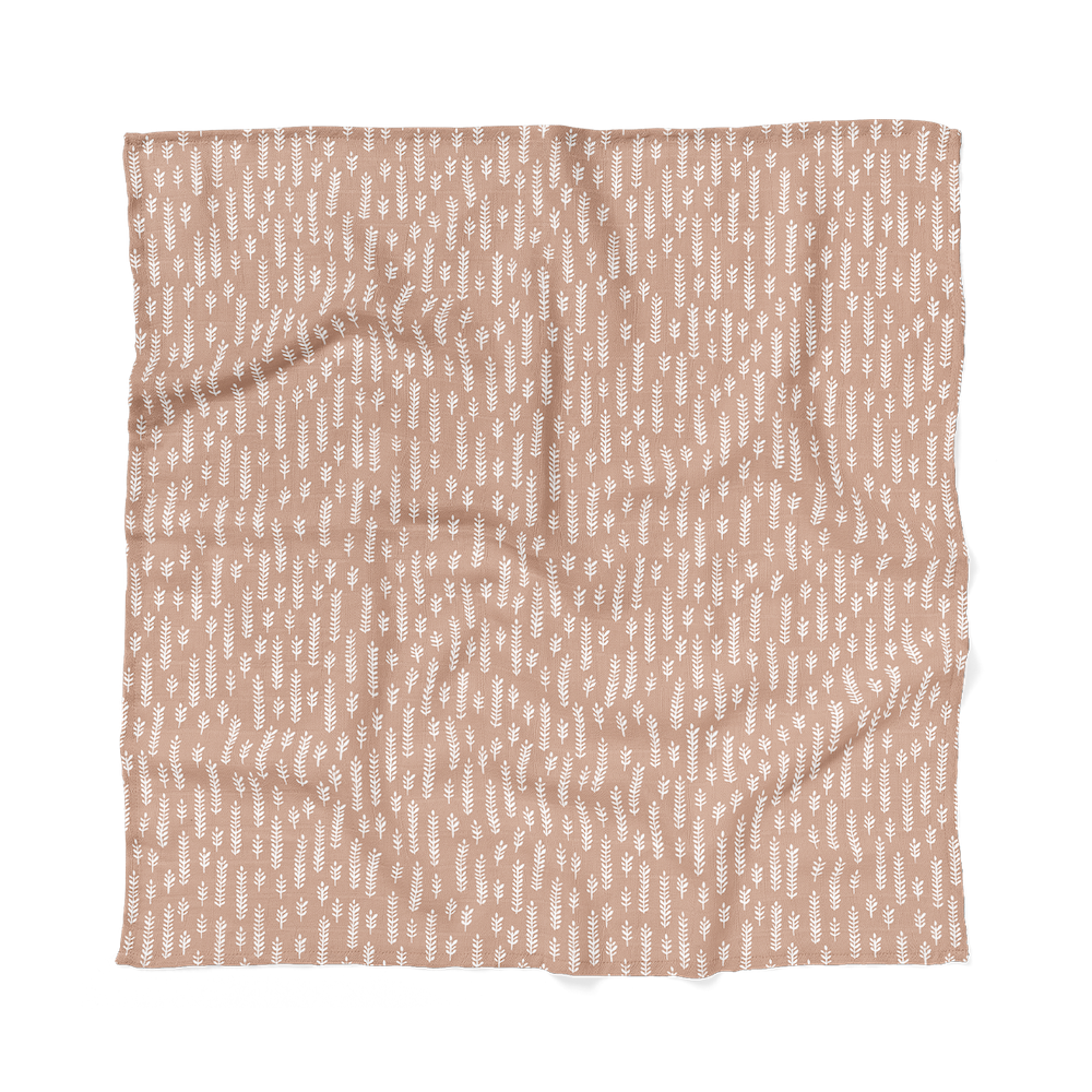 an image of the best swaddle that can be found on your baby registry the wheat in maple sugar color