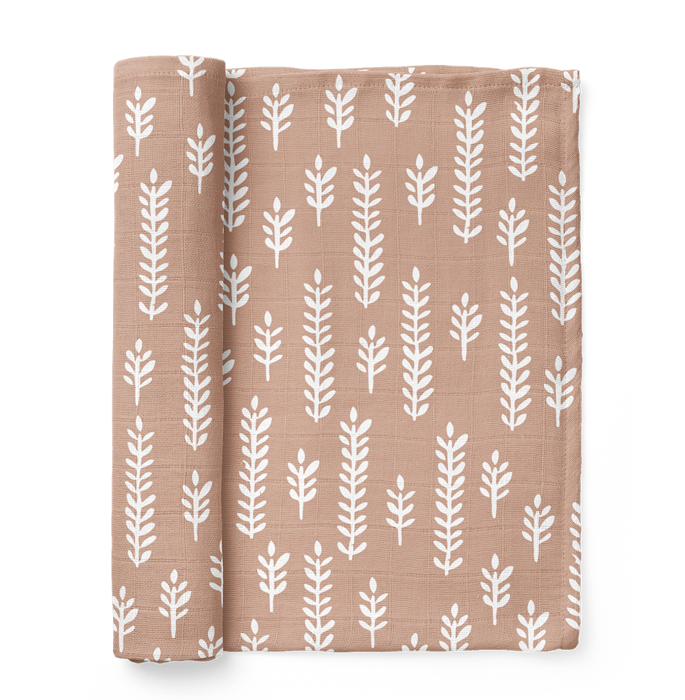 photo of a folded wheat muslin blankets in the color maple sugar best for your baby registry