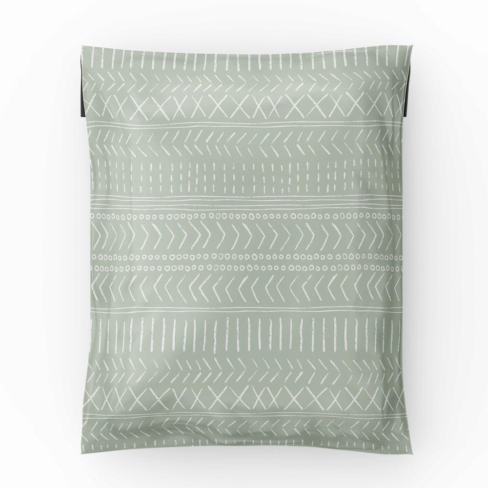 the 10x13 sage green boho geo mailers showing the geometric lines over the light green background