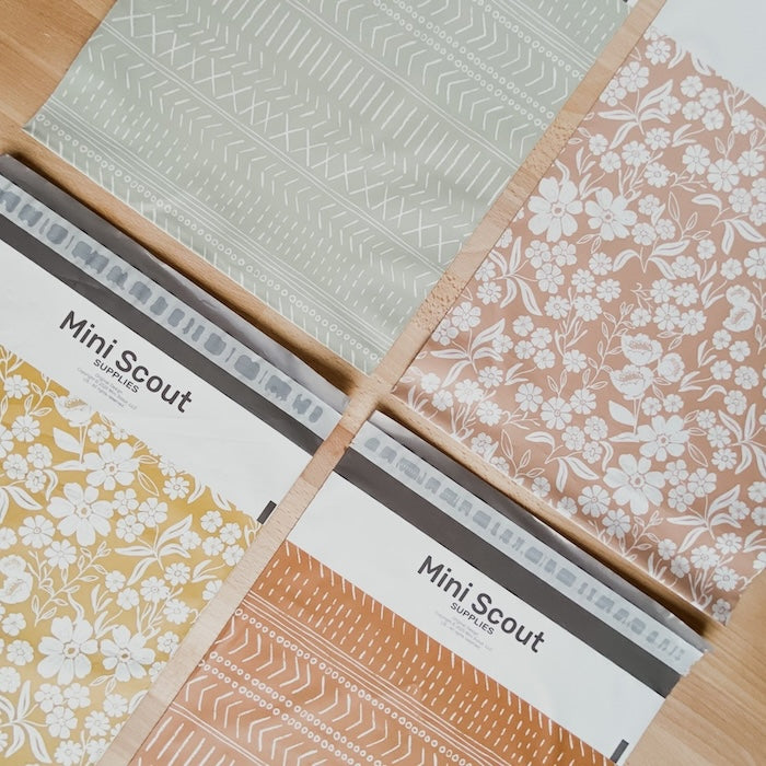 flatlay photo of the four available colors of the polymailers namely Pastel Green, Dusty Pink, Yellow and Brown with geo and floral designs and prints