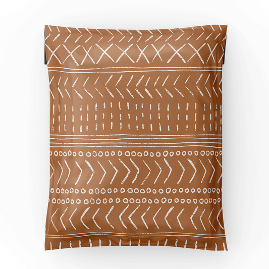 6x9 polymailer shipping bag laid flat showing the geometric lines over a brown background
