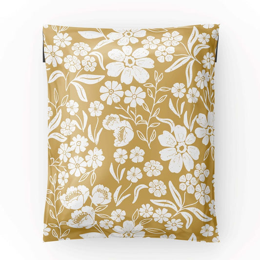 6x9 yellow polymailer shipping bag laid flat showing the white florals over the yellow background, laid flat