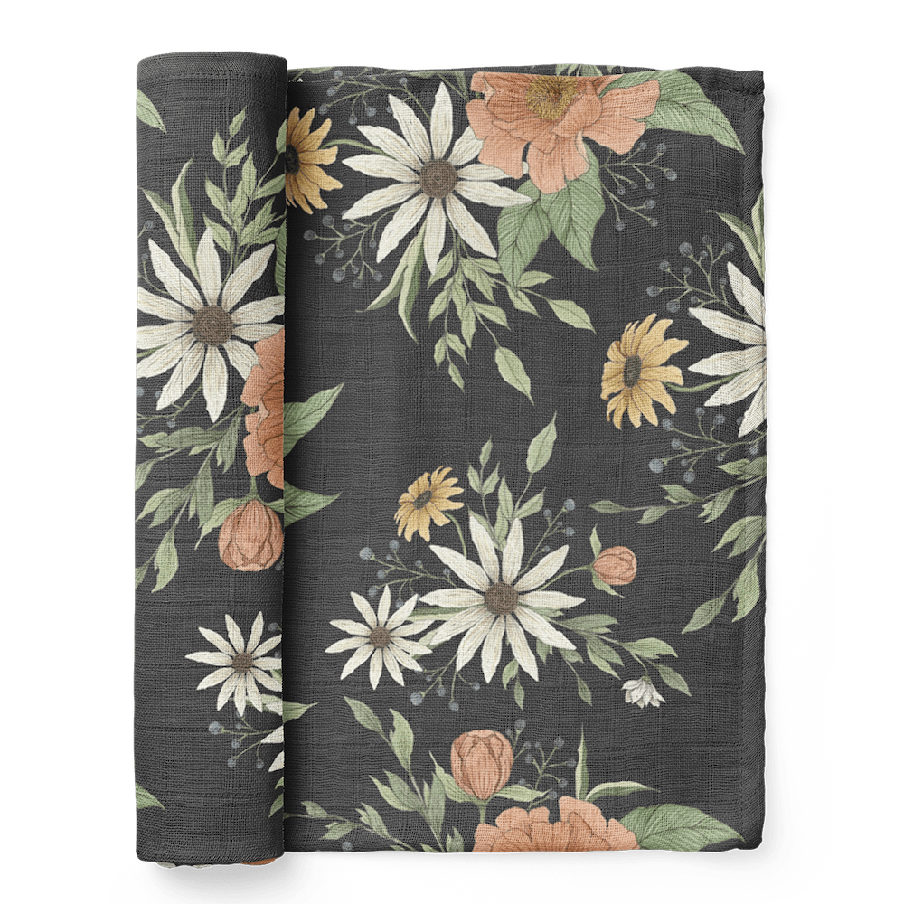 a folded spring blossom charcoal gray cotton swaddle