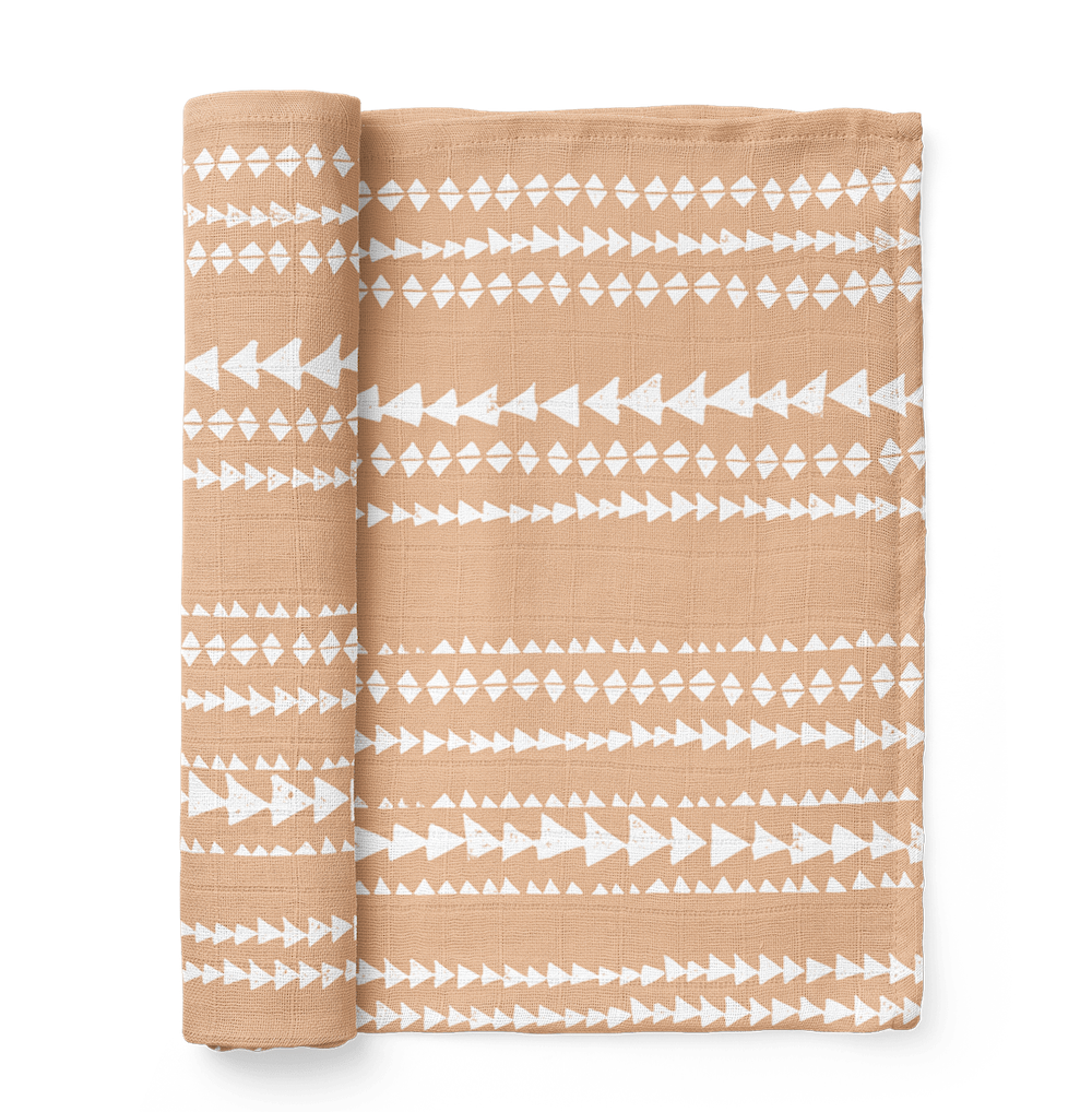 an image of the terrain muslin swaddle wrap for cute babies