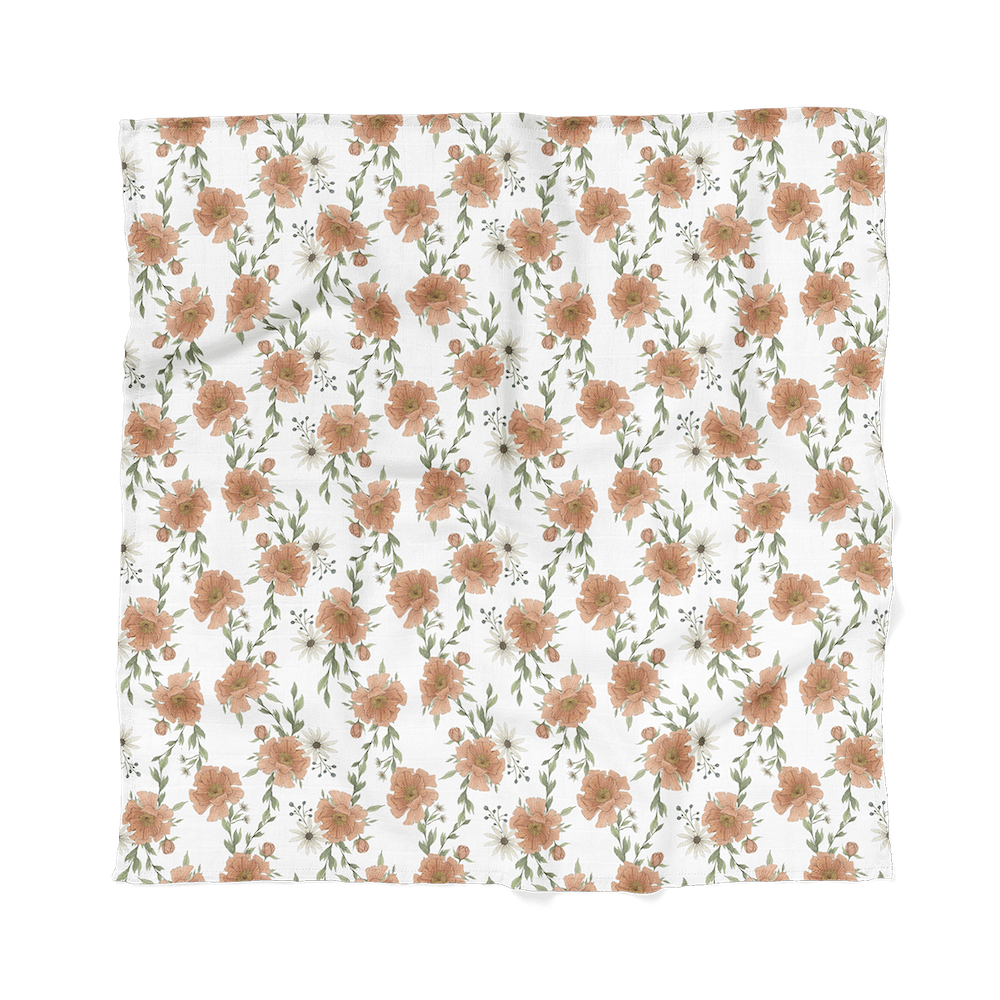 our peony swaddle cotton swaddle blankets laid flat showing the peony blossoms