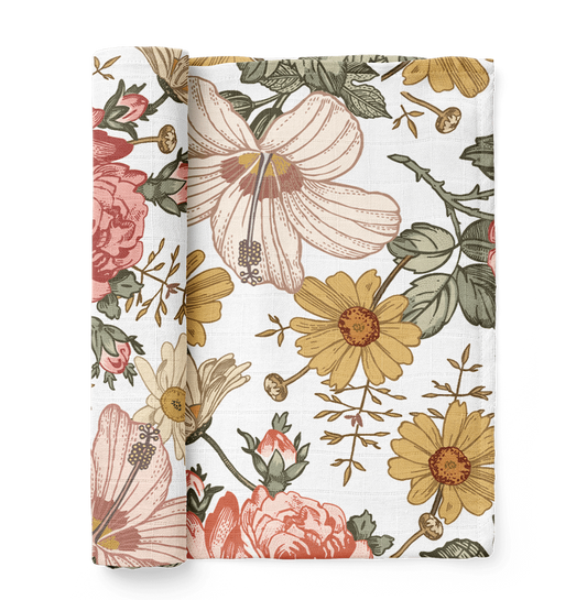 This is a best-selling mini wander swaddle with garden floral designs of Hibiscus flower, sunflower, and rose. This is made from muslin cotton that is light and breathable.