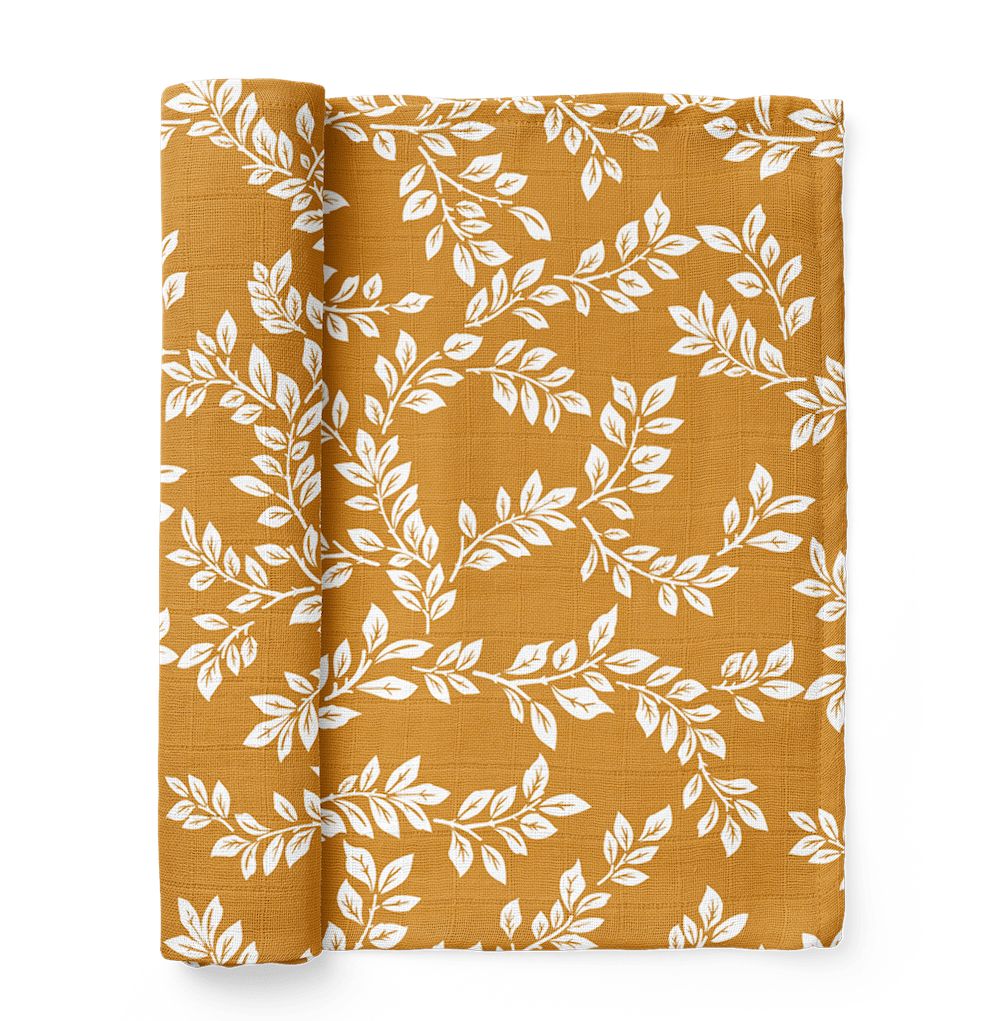 half rolled leaf swaddle blanket in the mustard color the perfect baby wrap or boy blankets