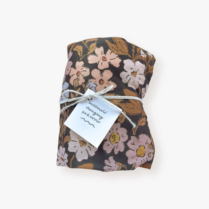 Jersey polyester cover with Thicket Floral pattern in cream, brown, peach, mauve, and blue flowers on a dark gray backdrop