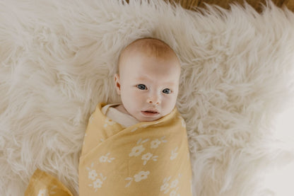 swaddle blankets baby girl wrapped around little baby