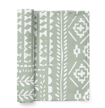 A photo of the Tapestry Green Spruce boy swaddle the perfect gift for baby