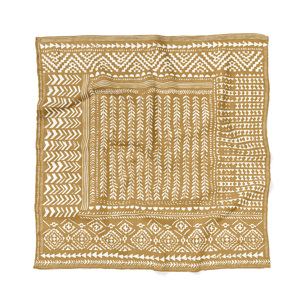 tapestry honey gold dark yellow blanket laid flat showing the boho and textured lines and patterns
