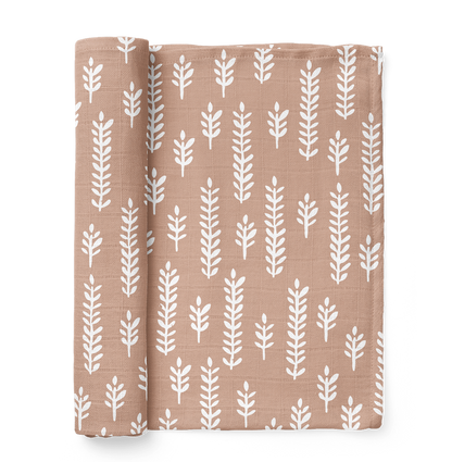photo of a folded wheat muslin blankets in the color maple sugar best for your baby registry