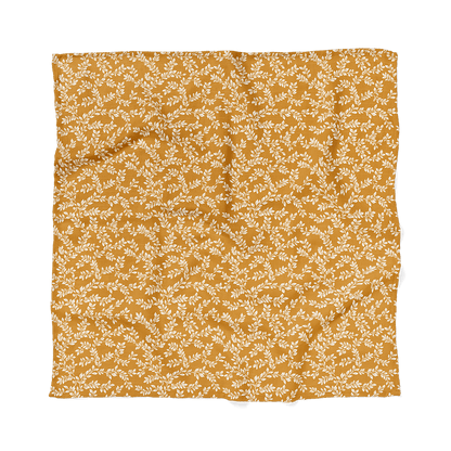 leaf swaddle blanket laid flat in the color mustard the perfect baby boy blankets for all seasons